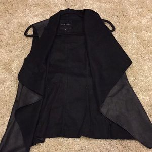 Faux leather vest with suede interlay!